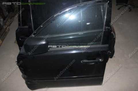 Передняя левая дверь Mitsubishi Pajero Sport  5700B529