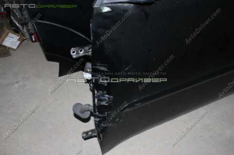 Передняя левая дверь Mitsubishi Pajero Sport  5700B529