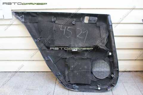 Внутренняя обшивка  задней правой двери  Mitsubishi LANCER 7222A434XG